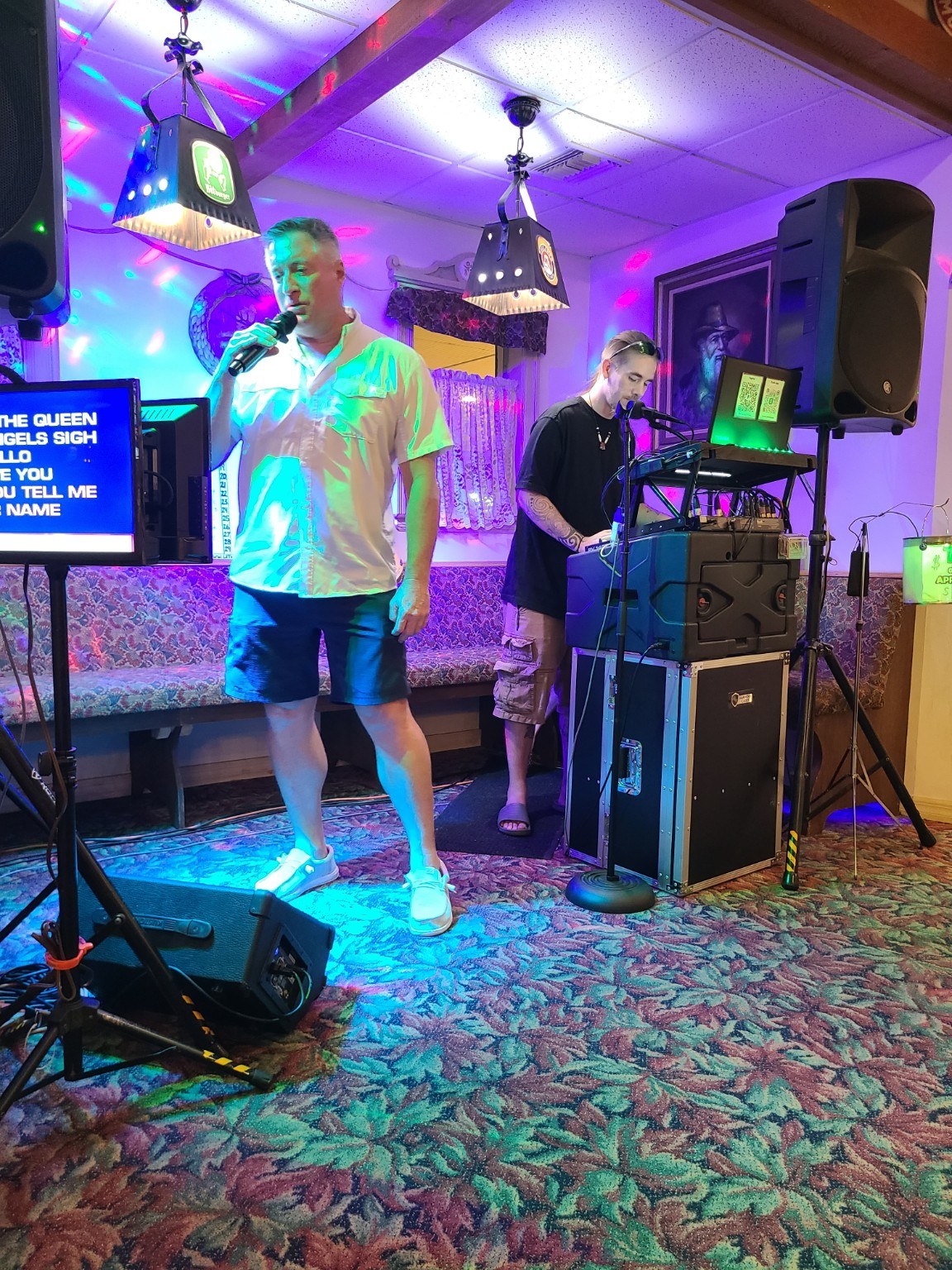 Singer performing with JDS karaoke equipment